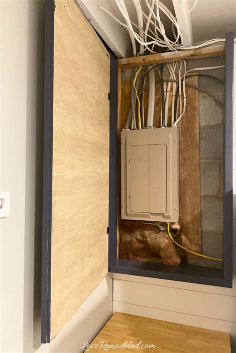 how to hide an electrical panel box|cabinet to hide electrical panel.